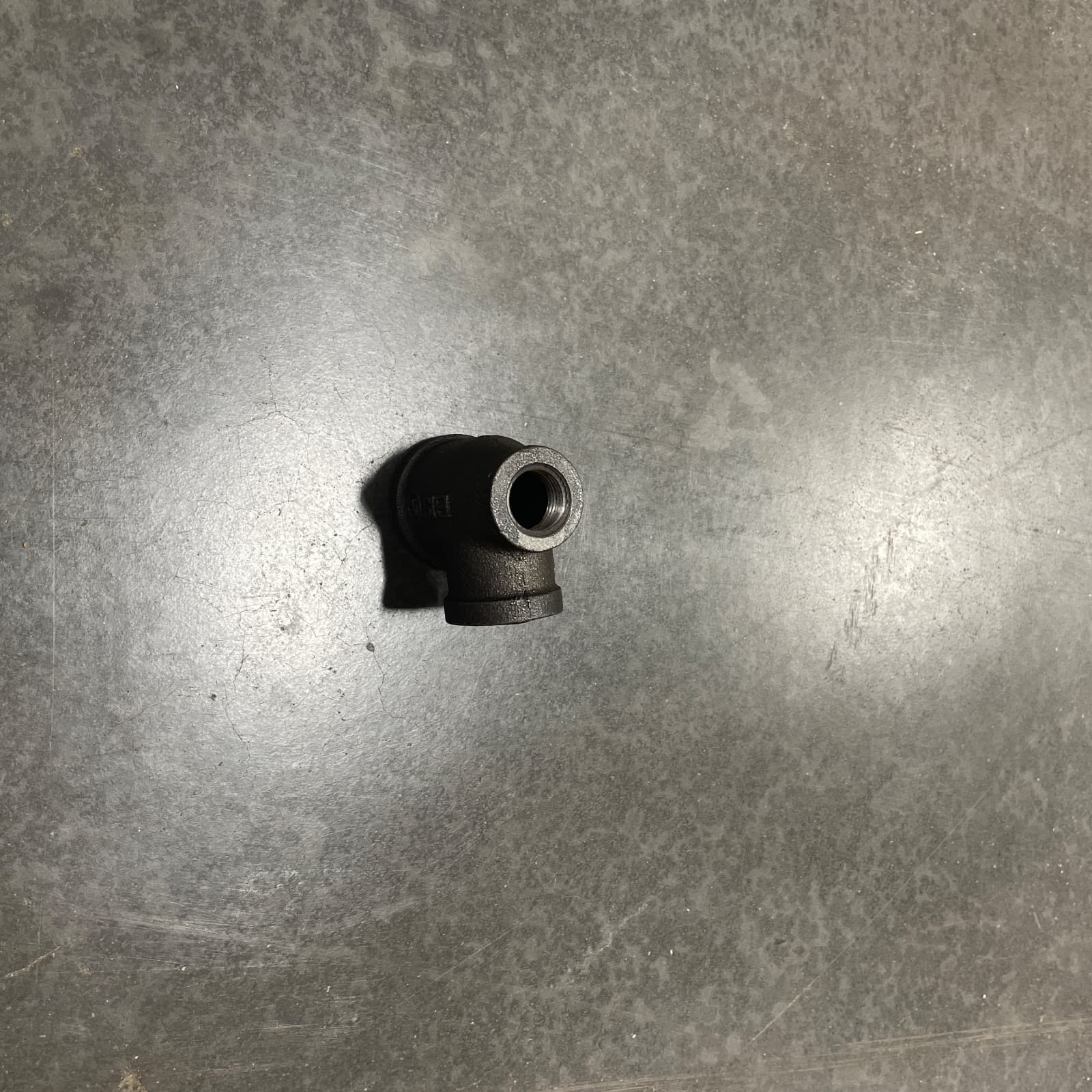 Proflo 1x1/2x3/4 in. FPT 150# Black Malleable Iron Reducing Tee MPN IBTGFD — image 1
